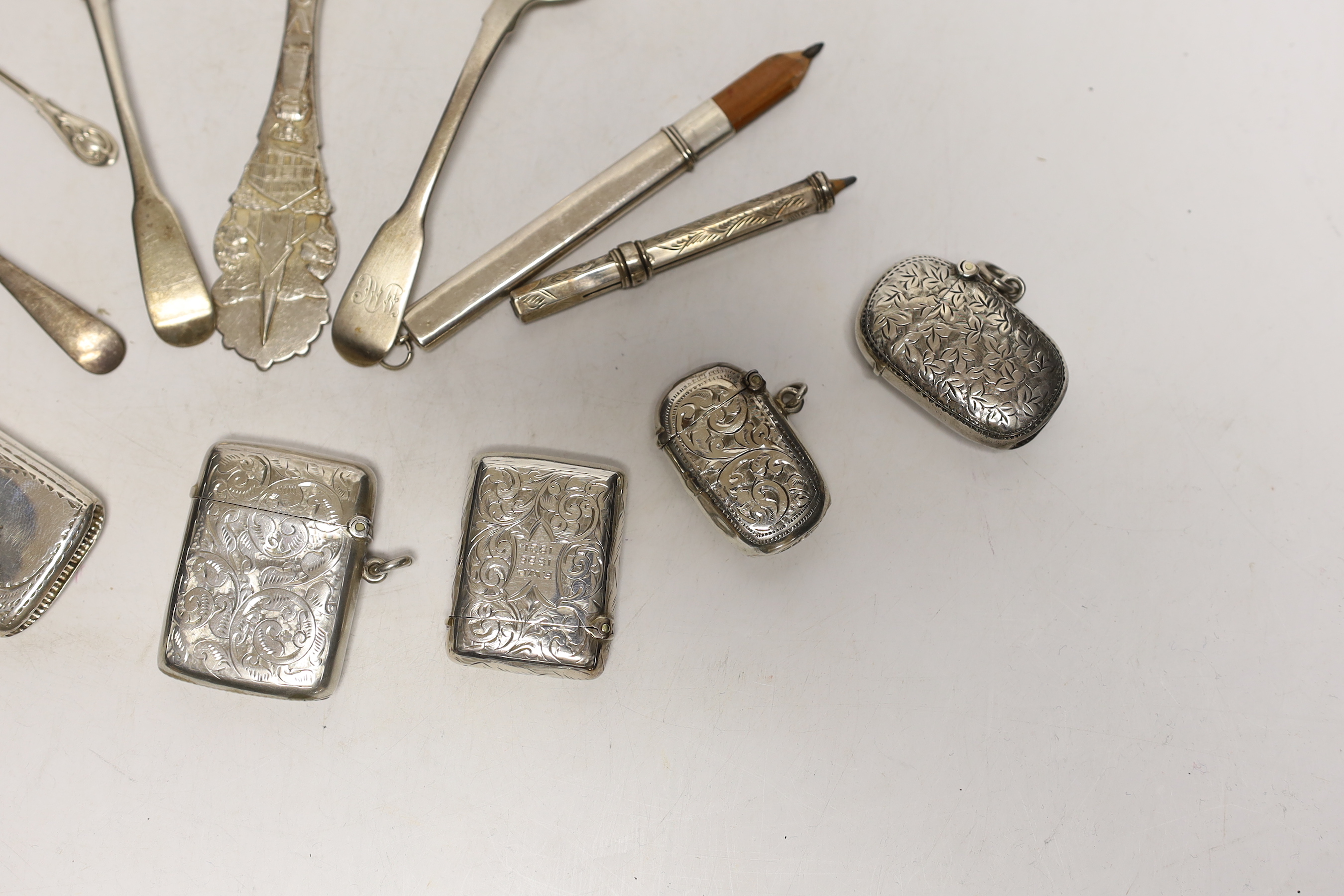 Six assorted early 20th century silver vesta cases, largest 45mm and a small quantity of sundry items including silver condiment spoons and two pencils.